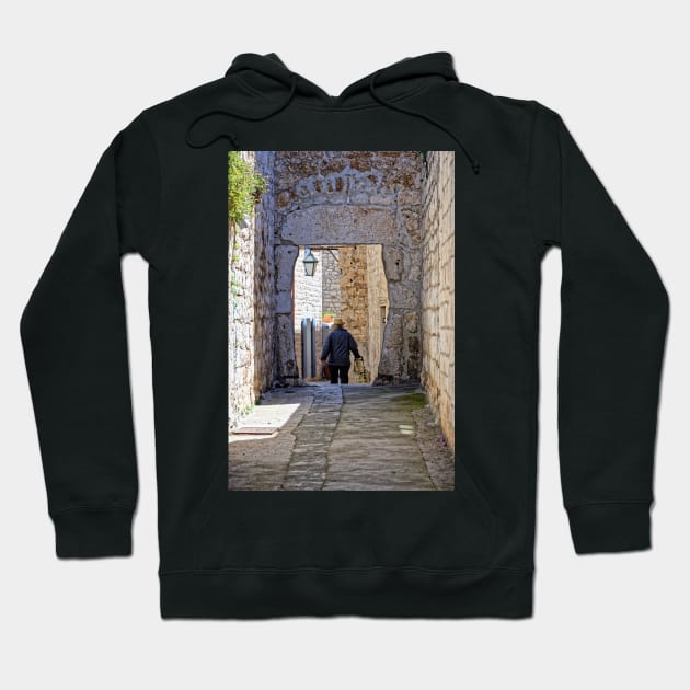 Man Walking Through Archway, Hvar Hoodie by BrianPShaw